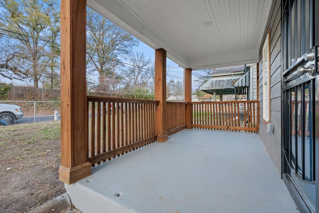 2859 Carnes Avenue Memphis, TN 38114 - Photo 3 of 14 a view of a porch with a yard