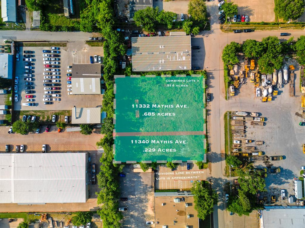 an aerial view of a house with outdoor space and street view