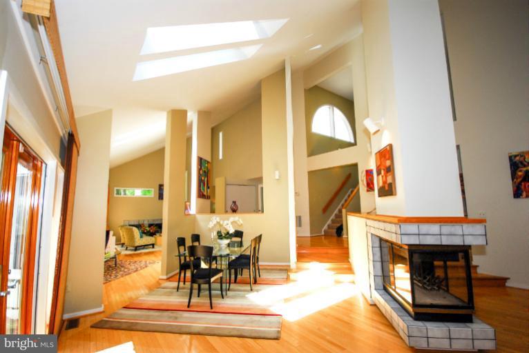 11576 Lake Newport Road Reston, VA 20194 - Photo 1 of 30 a living room with fireplace furniture and a fireplace