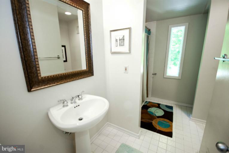 11576 Lake Newport Road Reston, VA 20194 - Photo 14 of 30 a bathroom with a sink and a mirror