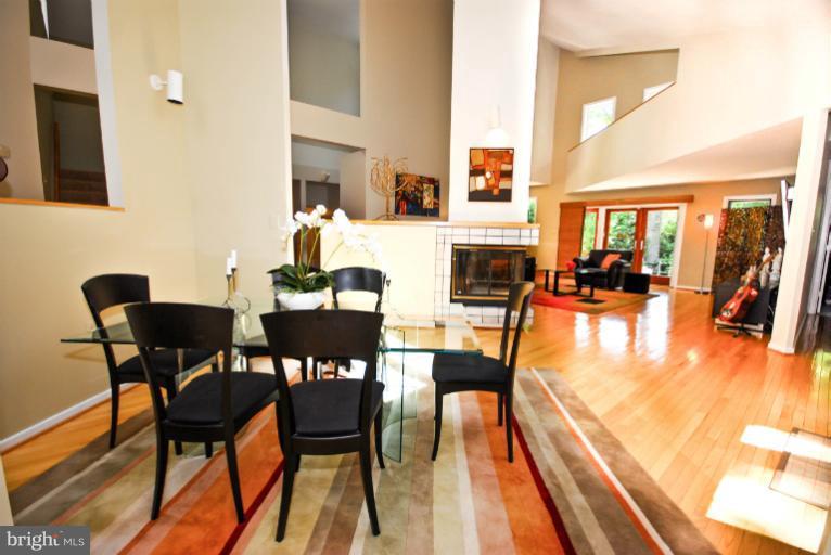 11576 Lake Newport Road Reston, VA 20194 - Photo 3 of 30 a view of a dining room with furniture and wooden floor