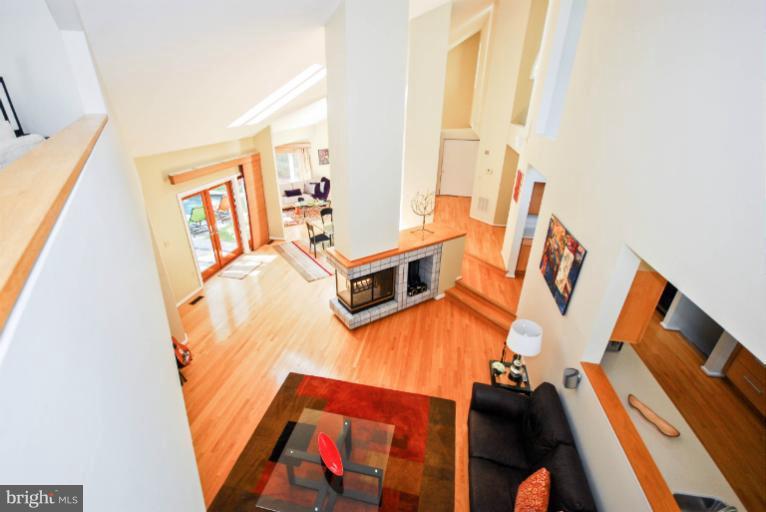 11576 Lake Newport Road Reston, VA 20194 - Photo 22 of 30 wooden floor with a view of a living room