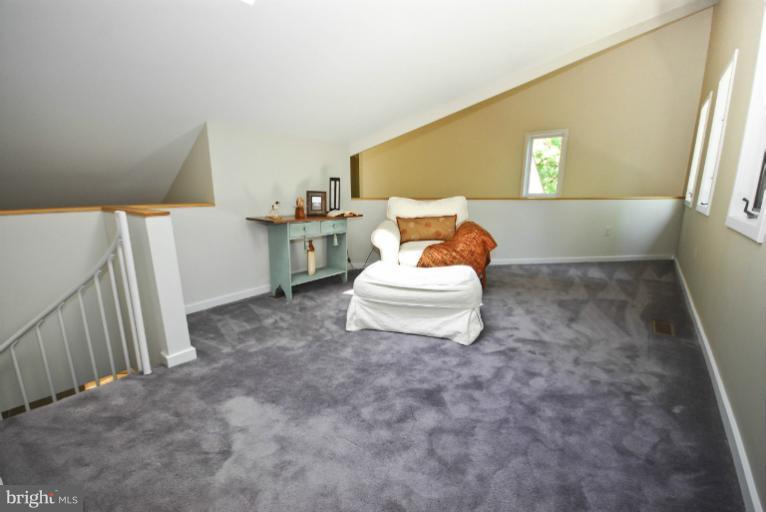 11576 Lake Newport Road Reston, VA 20194 - Photo 25 of 30 a bed room with a bed and a window