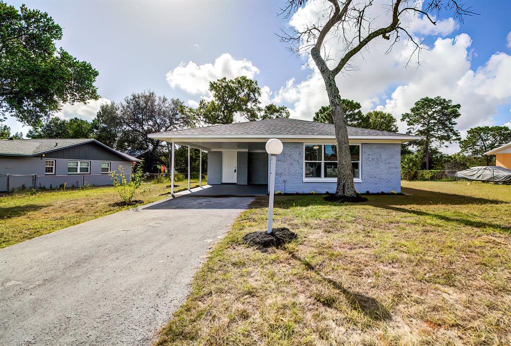 449 Spring Drive Ocala, FL 34472 - Photo 1 of 1 a view of a house with a swimming pool