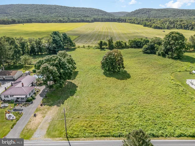 a view of a lake with a outdoor space