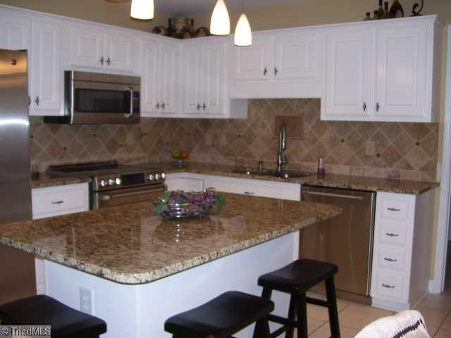 813 Raintree Court Randleman, NC 27317 - Photo 5 of 11 Kitchen. Granite countertops!