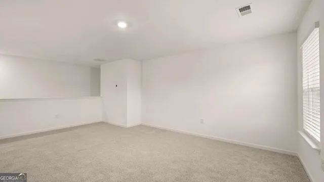 a view of house with yard entertaining space and seating area