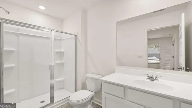 a front view of a house with a lake view