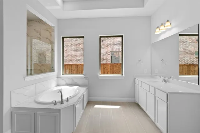 a bathroom with a sink and a bathtub