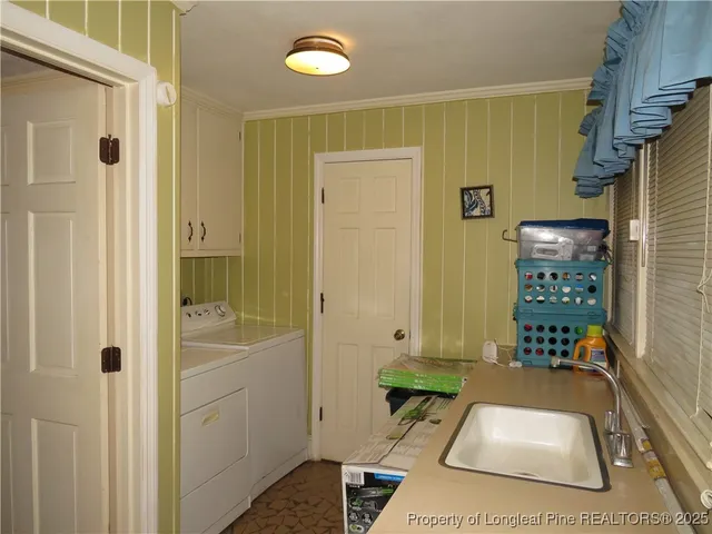 a en suite bathroom with a sink a mirror and a shower