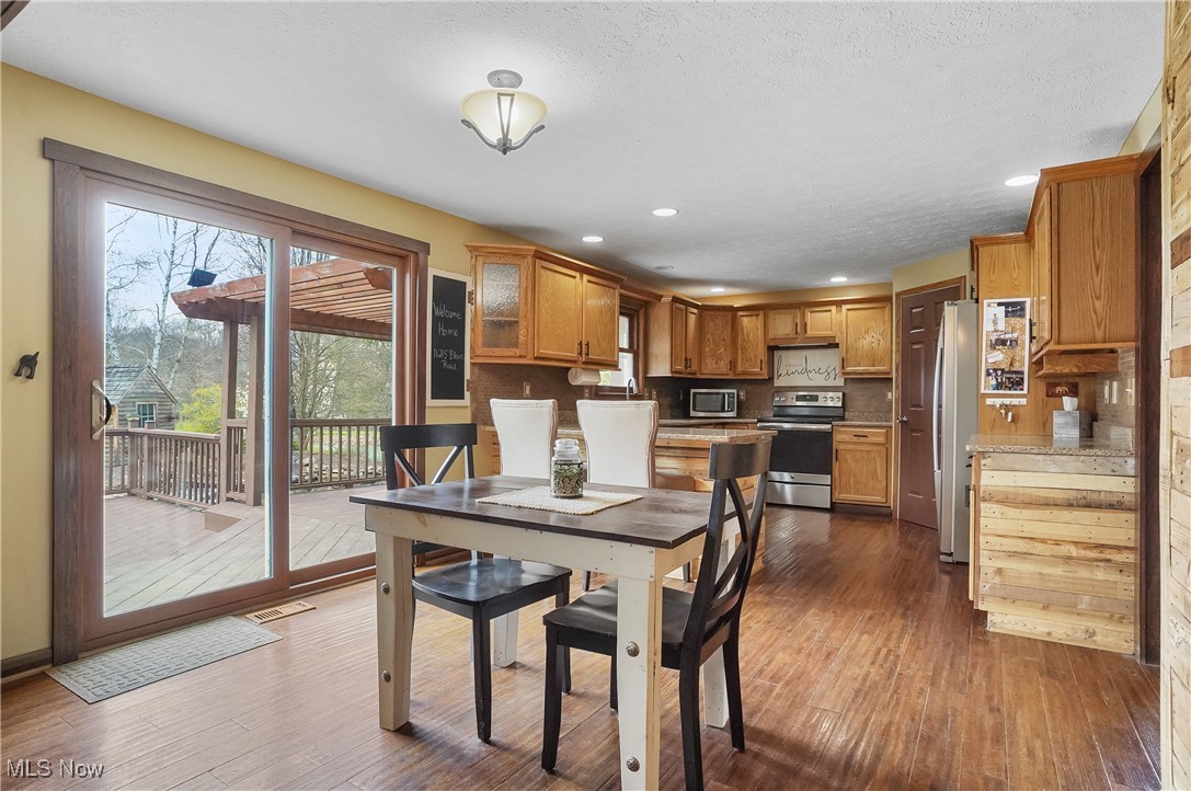 11215 Bloom Road Garrettsville, OH 44231 - Photo 9 of 42 Dining space with recessed lighting