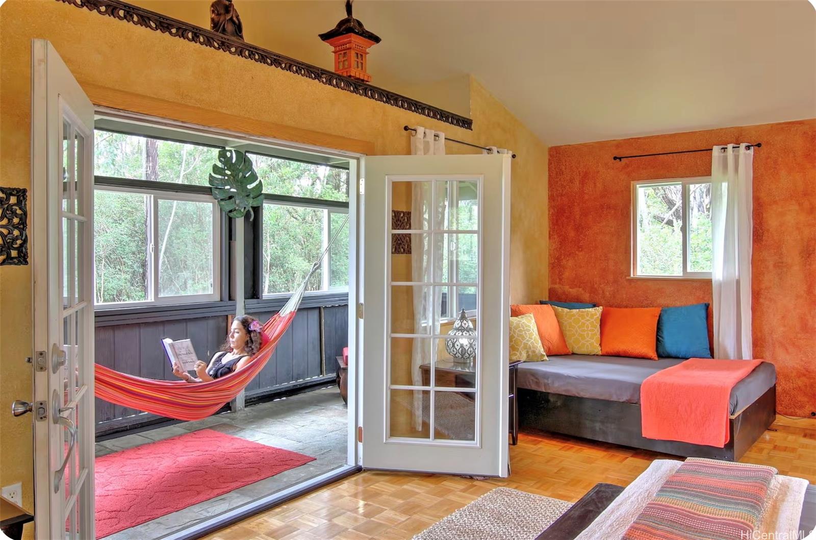 18-4011 Makuahine Road Mountain View, HI 96771 - Photo 15 of 24 a living room with furniture and a window