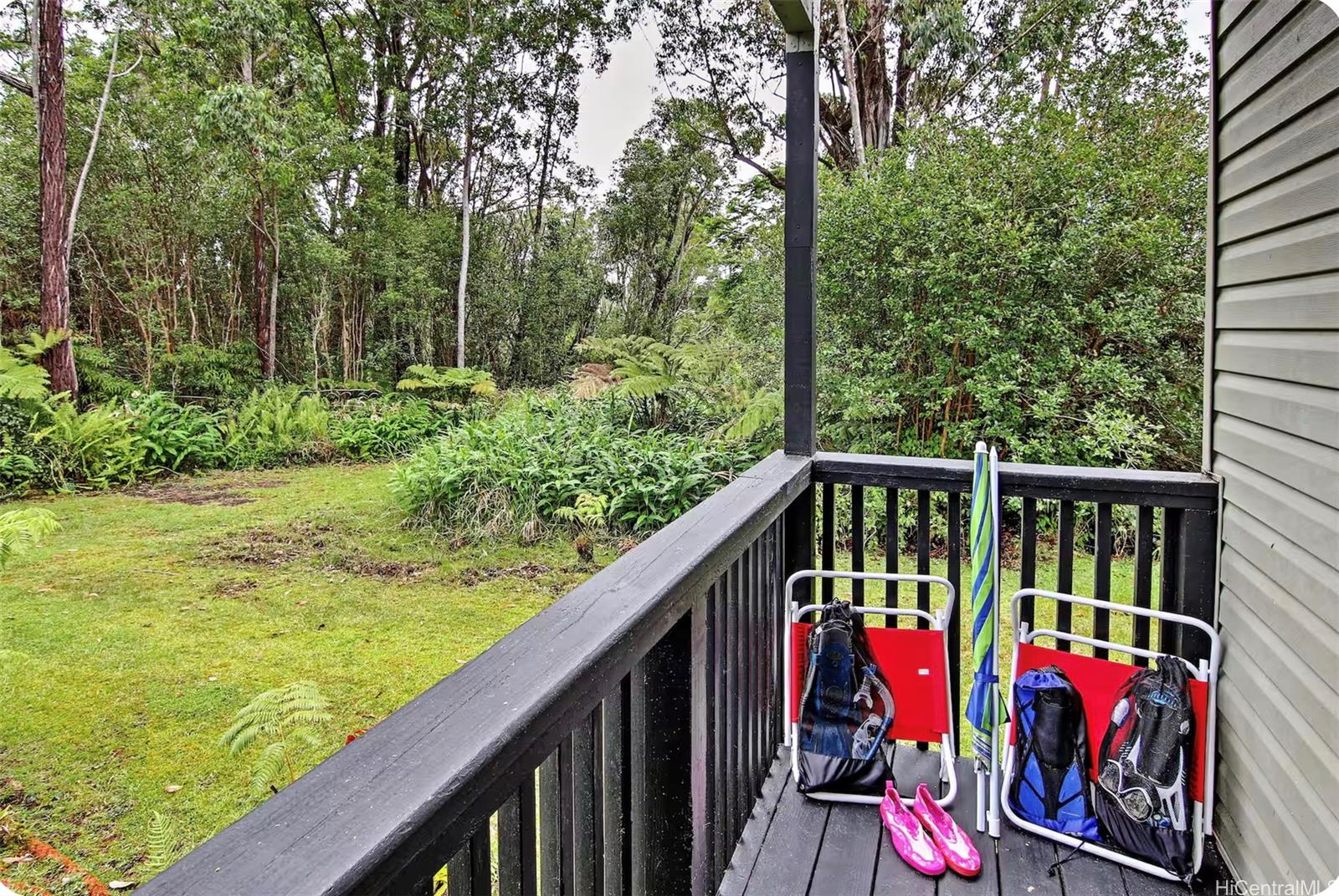 18-4011 Makuahine Road Mountain View, HI 96771 - Photo 19 of 24 a view of balcony with outdoor seating