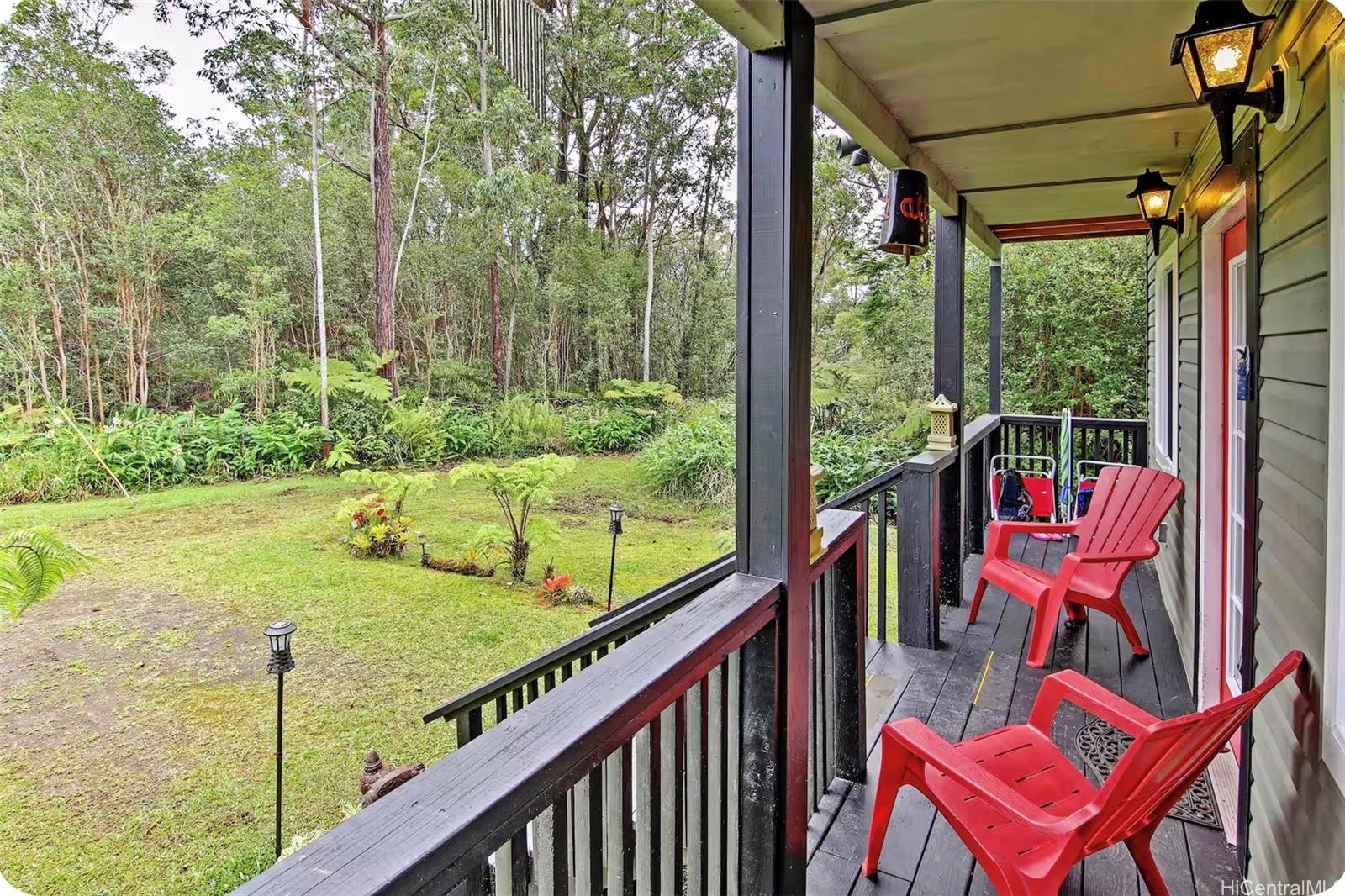 18-4011 Makuahine Road Mountain View, HI 96771 - Photo 20 of 24 a view of an outdoor sitting area
