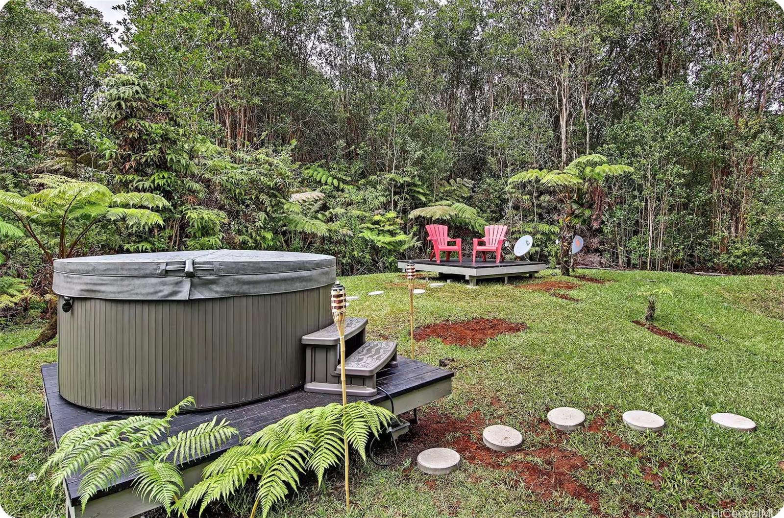 18-4011 Makuahine Road Mountain View, HI 96771 - Photo 2 of 24 a view of outdoor space and yard