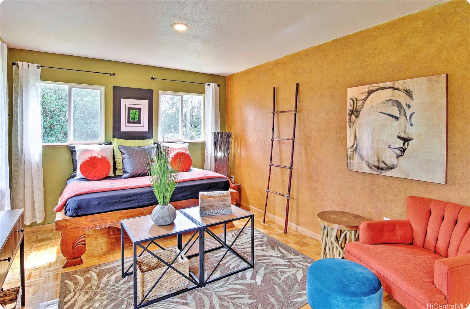 18-4011 Makuahine Road Mountain View, HI 96771 - Photo 4 of 24 a living room with furniture and a window