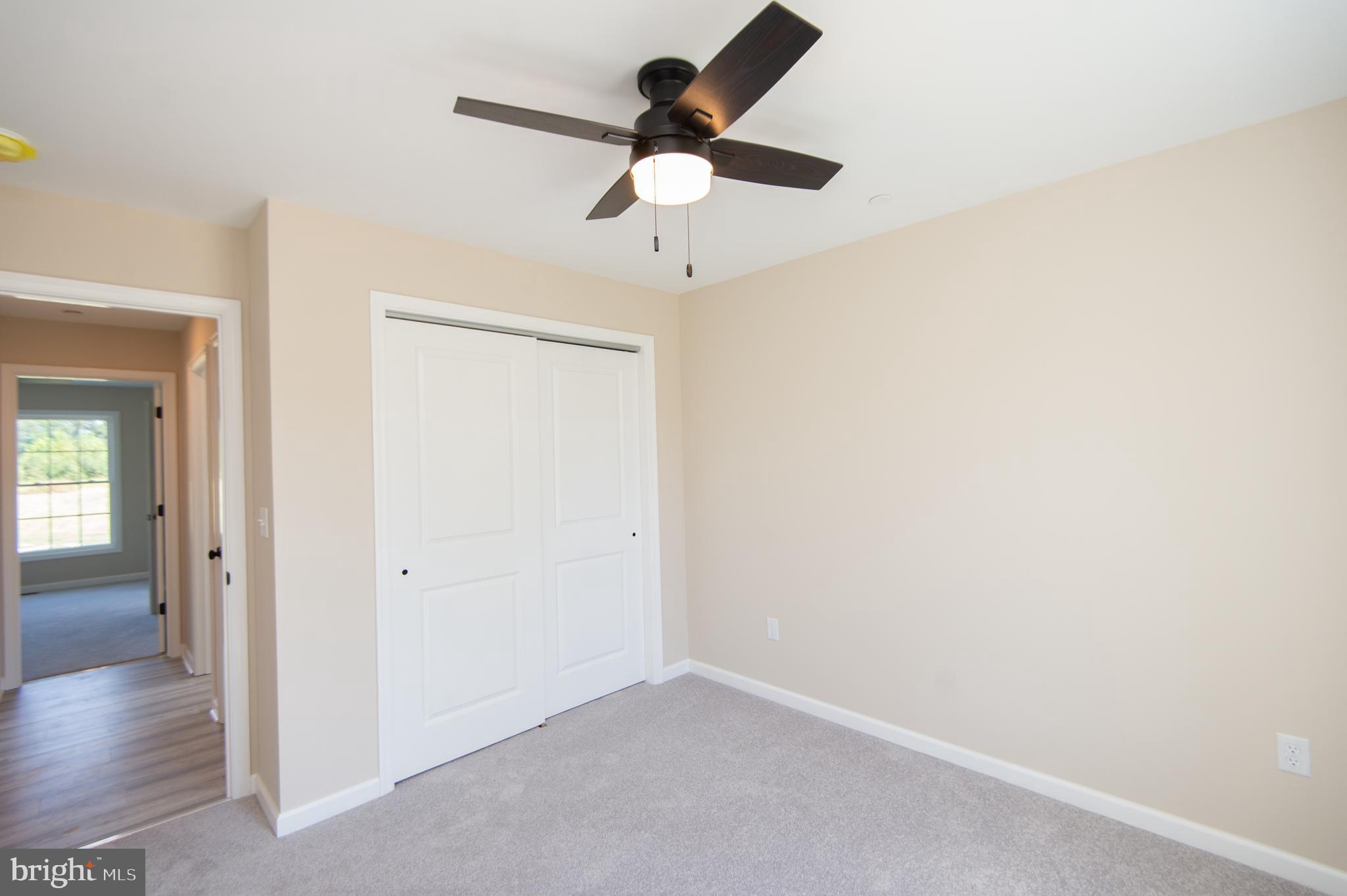 Wrights Rest Road Hurlock, MD 21643 - Photo 16 of 25 wooden floor in an empty room