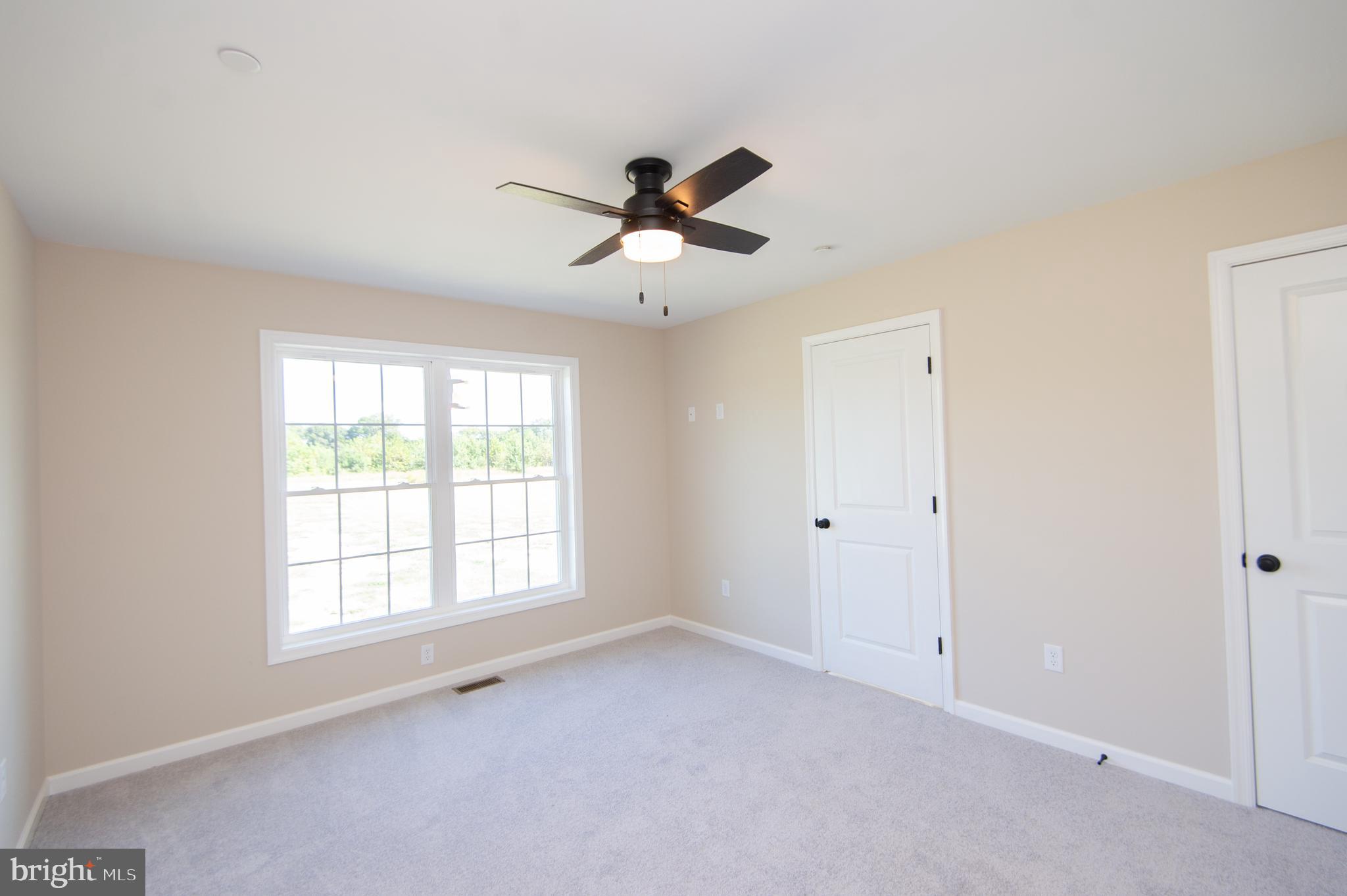 Wrights Rest Road Hurlock, MD 21643 - Photo 19 of 25 a view of an empty room with a window