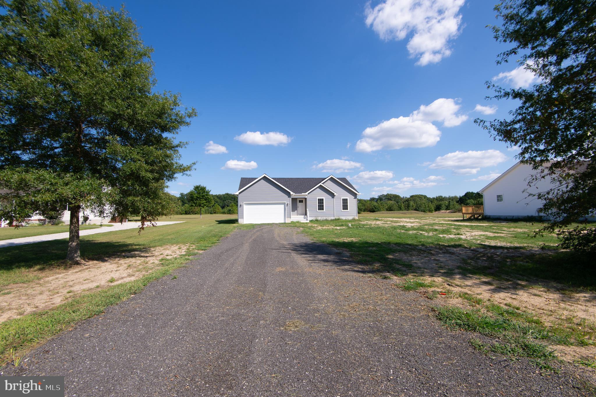 Wrights Rest Road Hurlock, MD 21643 - Photo 2 of 25 a view of a house with a big yard
