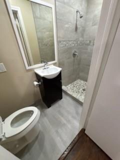 1570 Sutter Street Dallas, TX 75216 - Photo 15 of 17 a bathroom with a sink toilet and shower