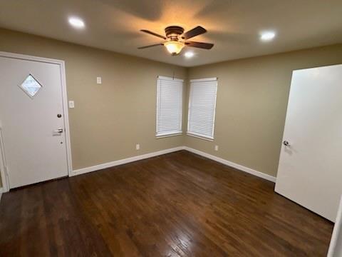 1570 Sutter Street Dallas, TX 75216 - Photo 3 of 17 an empty room with wooden floor and a ceiling fan