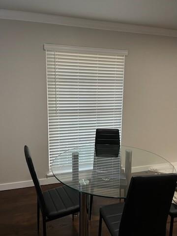 1570 Sutter Street Dallas, TX 75216 - Photo 6 of 17 a view of a dining room with furniture and wooden floor