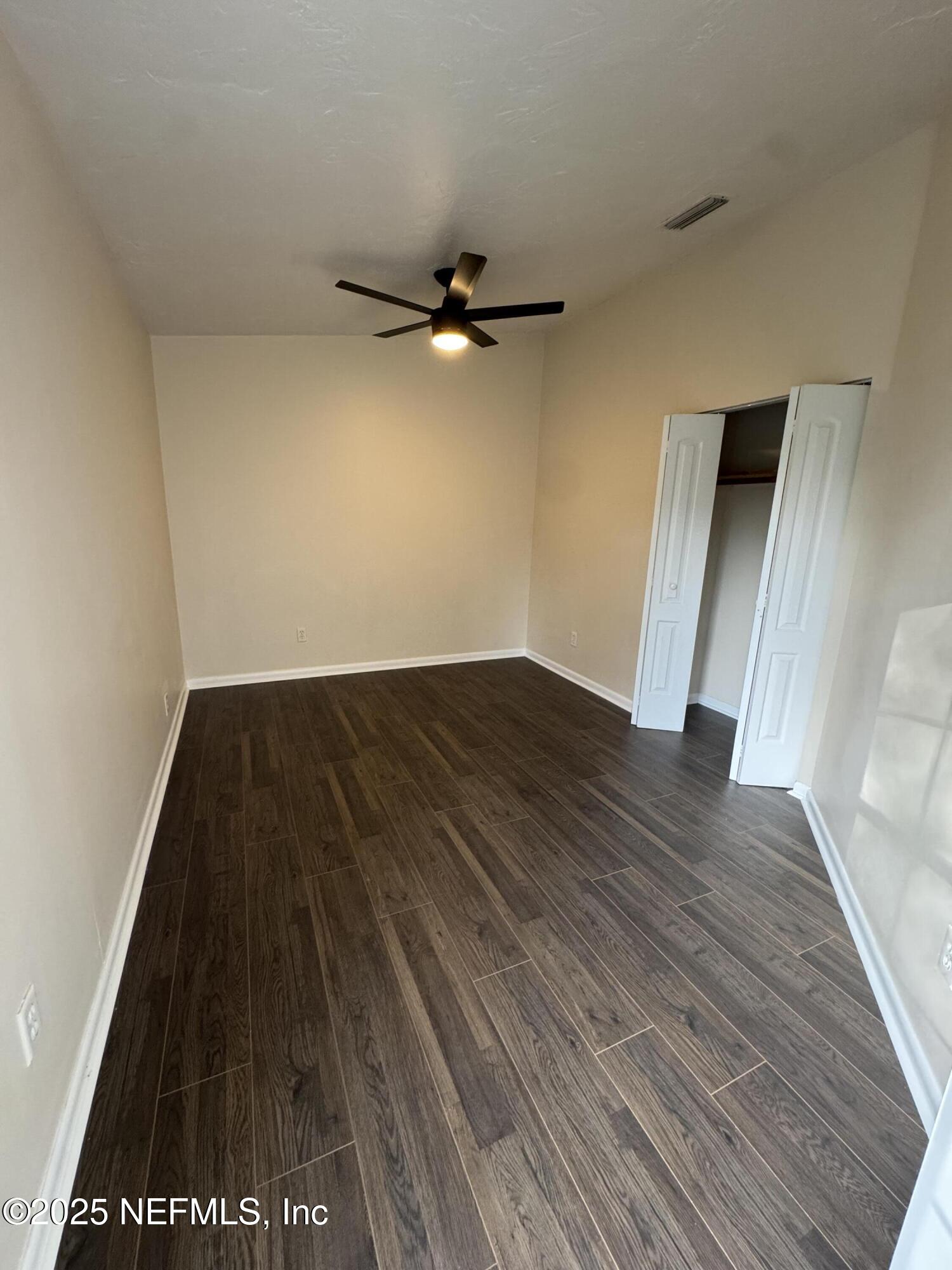 10244 Pine Breeze Road South Jacksonville, FL 32257 - Photo 12 of 16 wooden floor in an empty room
