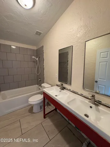 a view of porch with wooden floor