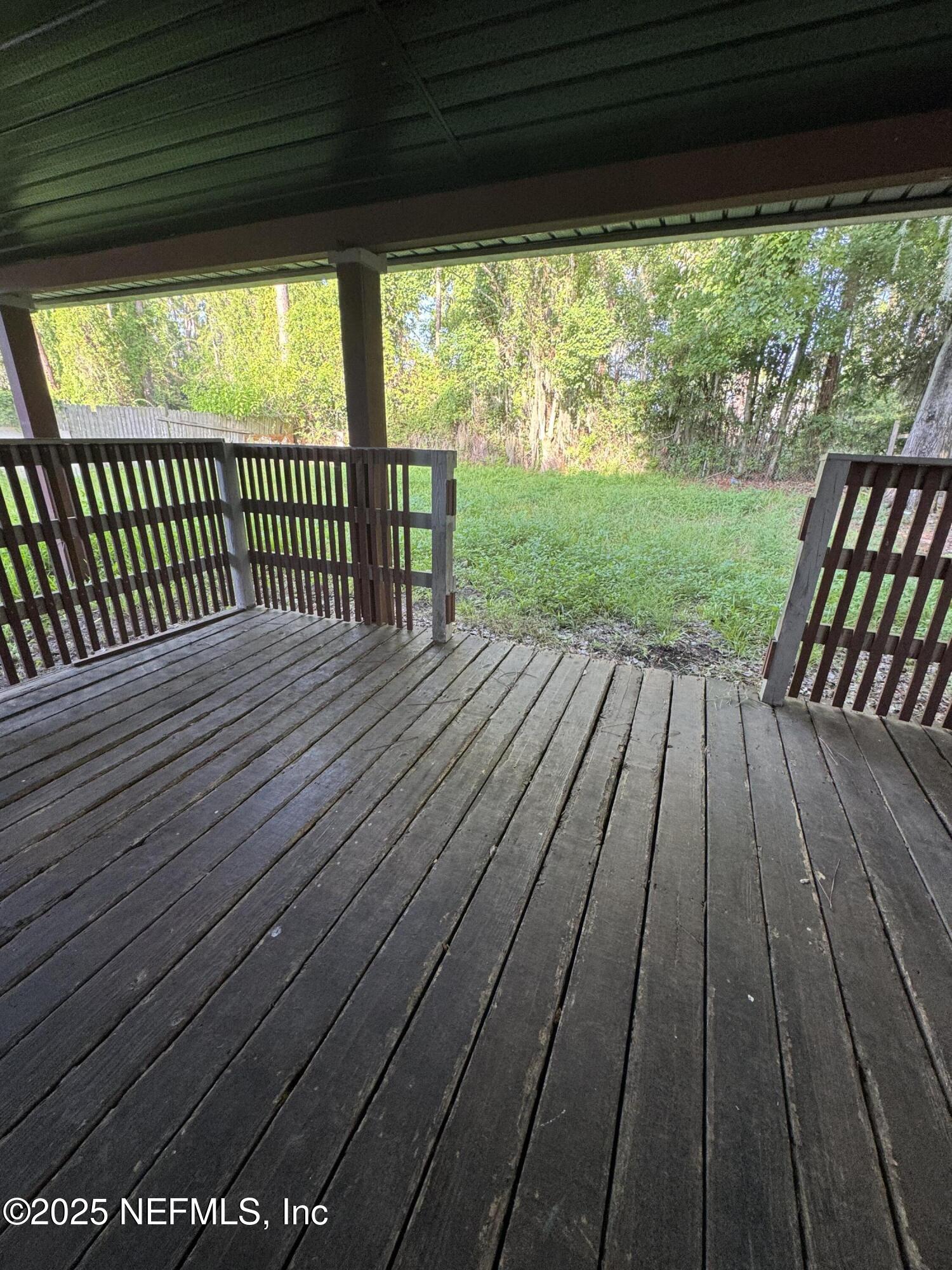 10244 Pine Breeze Road South Jacksonville, FL 32257 - Photo 16 of 16 a view of porch with wooden floor