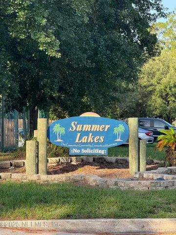 a sign on the side of a road