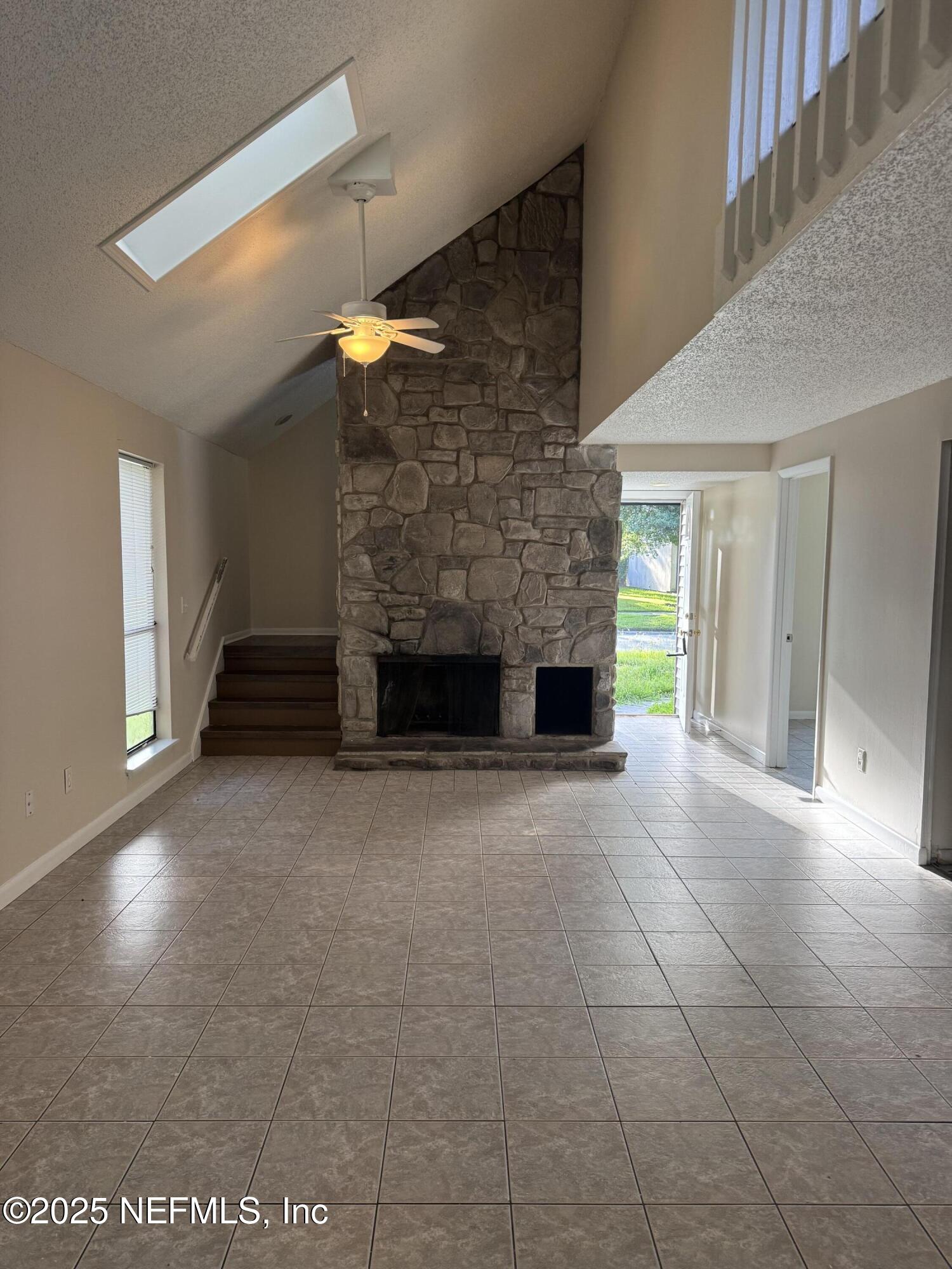 10244 Pine Breeze Road South Jacksonville, FL 32257 - Photo 3 of 16 a view of empty room with a fireplace