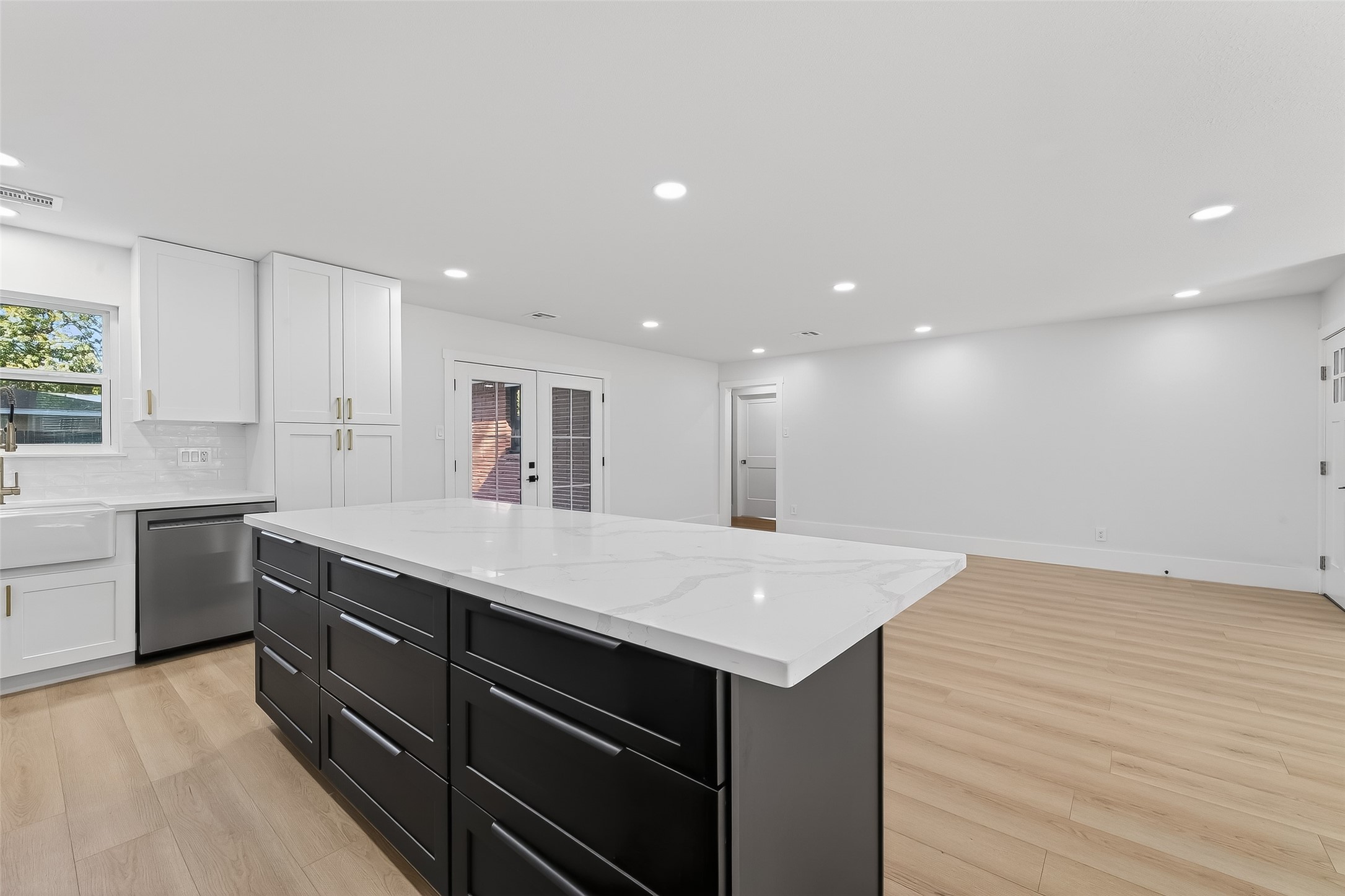9770 Cedardale Drive Houston, TX 77055 - Photo 12 of 40 a kitchen with a sink and cabinets