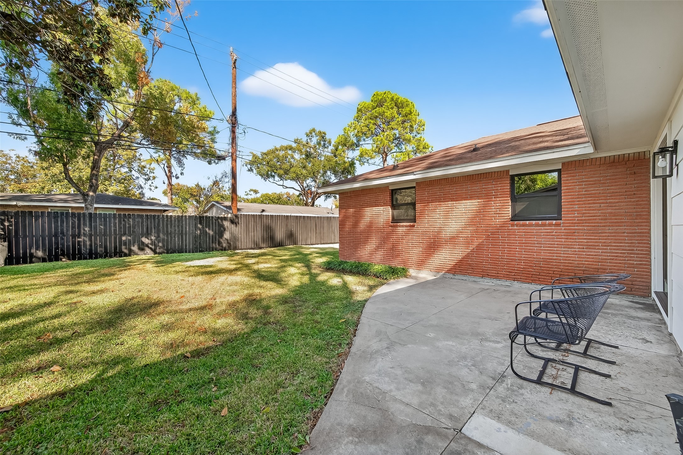 9770 Cedardale Drive Houston, TX 77055 - Photo 37 of 40 a view of a backyard with chairs