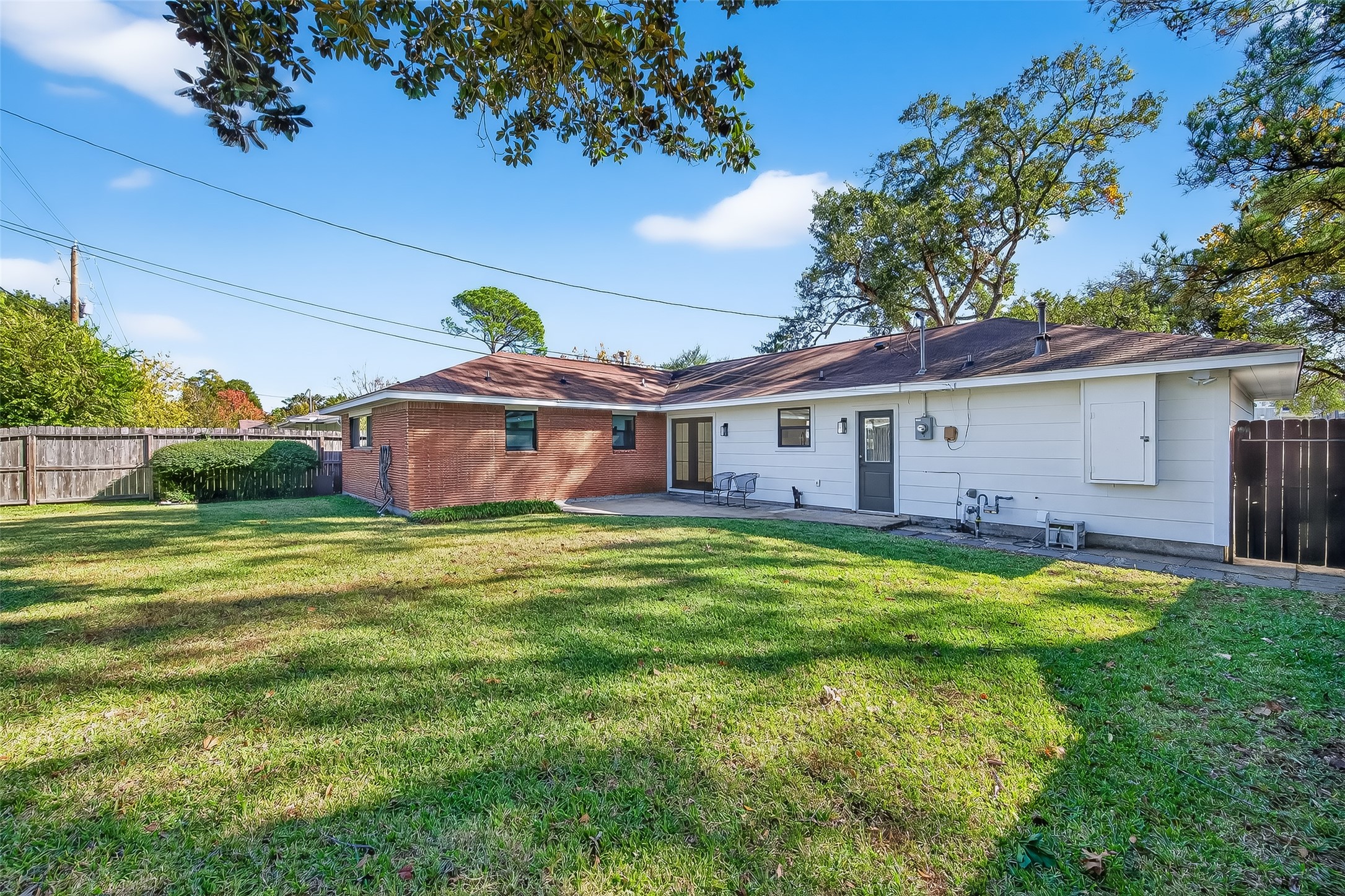 9770 Cedardale Drive Houston, TX 77055 - Photo 40 of 40 a view of a house with a backyard