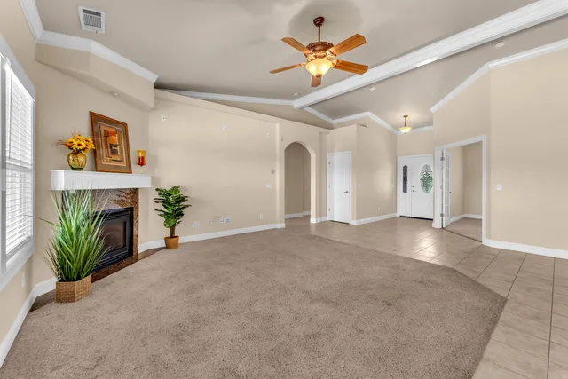 a view of a hallway with a chandelier