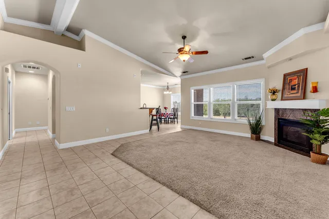 a view of livingroom with hardwood floor and a ceiling fan