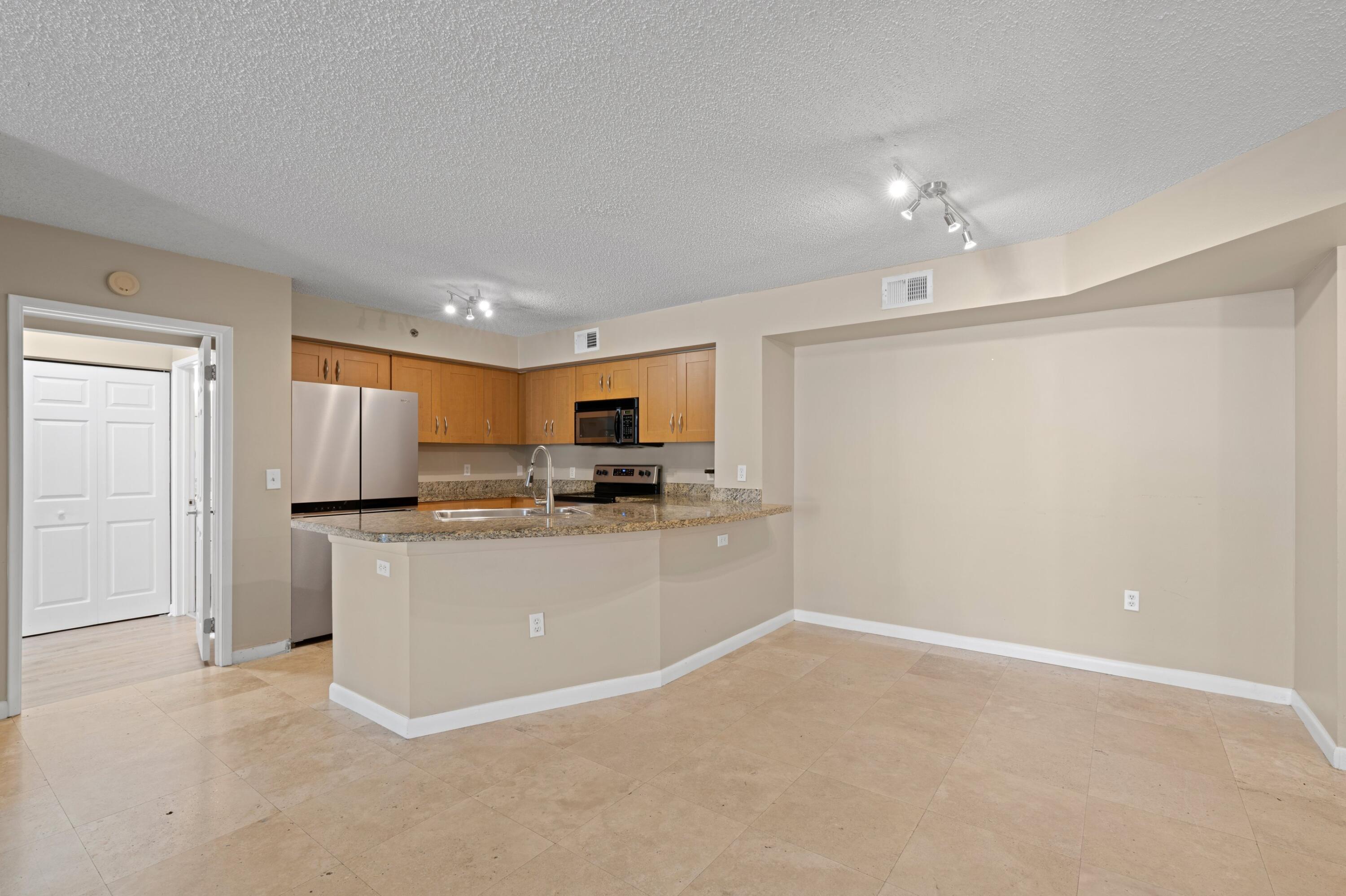 3133 Clint Moore Road, Unit 103 Boca Raton, FL 33496 - Photo 1 of 18 1
