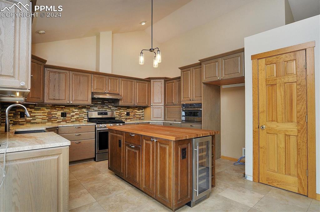 1204 Hitching Post Road Cotopaxi, CO 81223 - Photo 11 of 49 a kitchen with a stove sink and refrigerator