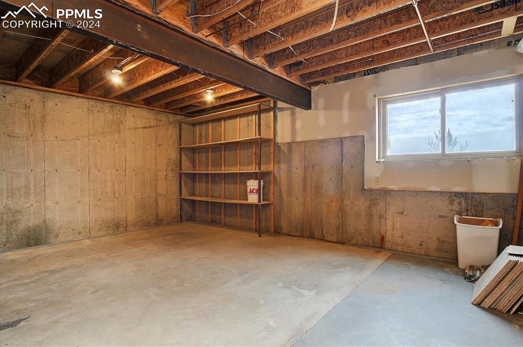 1204 Hitching Post Road Cotopaxi, CO 81223 - Photo 29 of 49 a view of an empty room with a garage