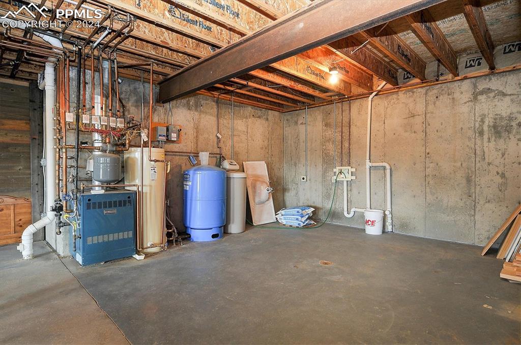 1204 Hitching Post Road Cotopaxi, CO 81223 - Photo 34 of 49 a view of a room with wooden walls