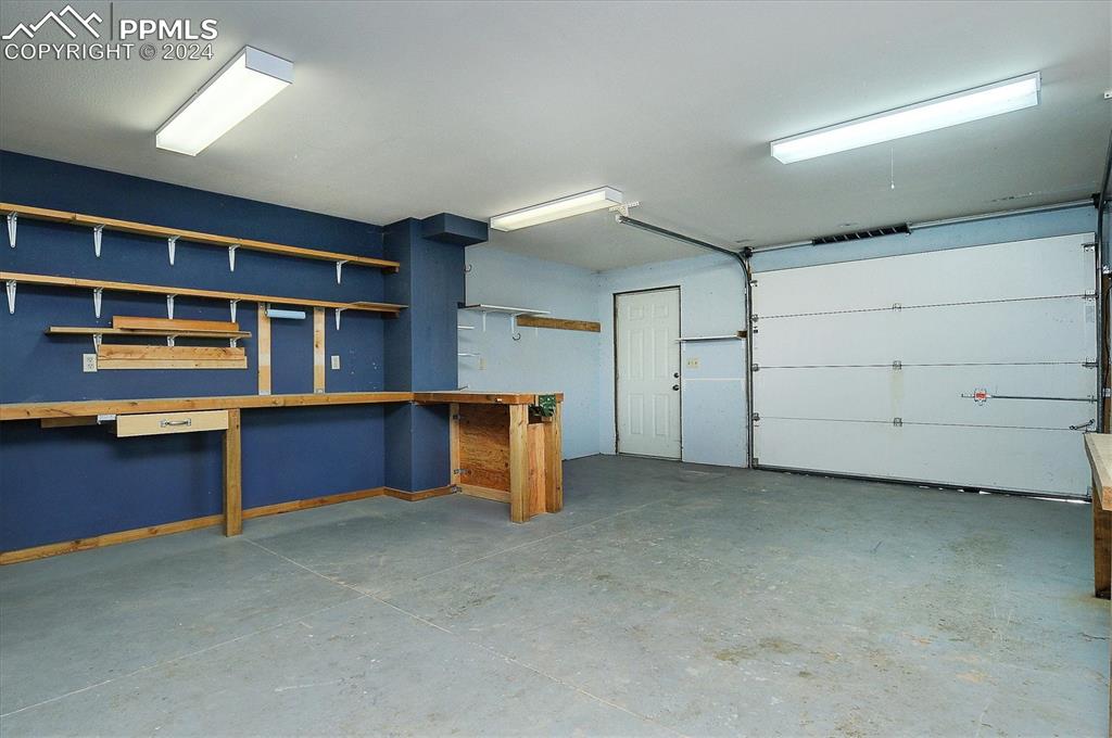 1204 Hitching Post Road Cotopaxi, CO 81223 - Photo 37 of 49 a view of an empty room with cabinet and stairs