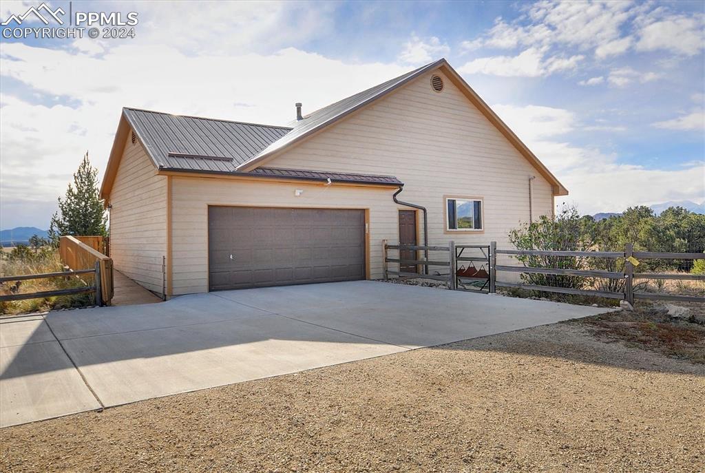 1204 Hitching Post Road Cotopaxi, CO 81223 - Photo 43 of 49 a view of garage and deck