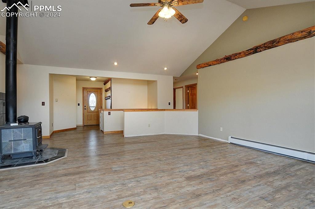 1204 Hitching Post Road Cotopaxi, CO 81223 - Photo 6 of 49 a view of empty room with wooden floor and fan