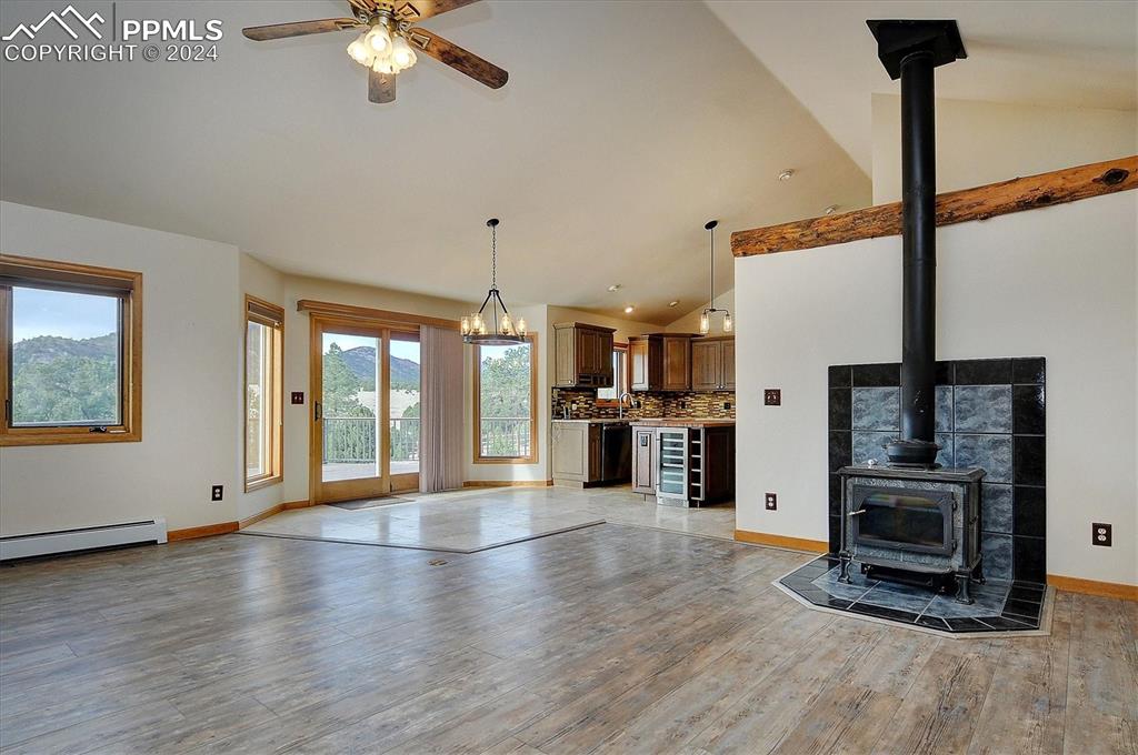 1204 Hitching Post Road Cotopaxi, CO 81223 - Photo 7 of 49 a view of a livingroom with a furniture an empty room and fireplace