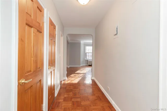 a kitchen with a refrigerator and a stove