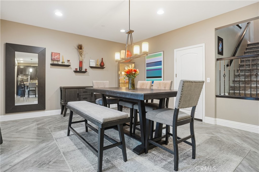 25654 Red Hawk Road Corona, CA 92883 - Photo 22 of 75 a dining room with furniture and window