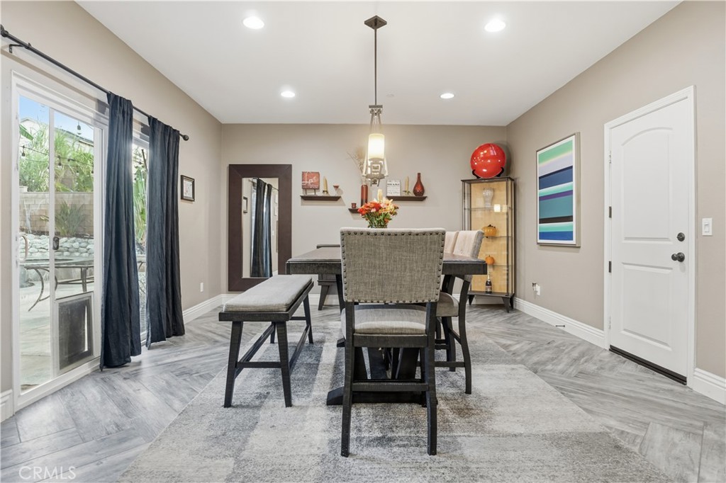 25654 Red Hawk Road Corona, CA 92883 - Photo 23 of 75 a view of a dining room with furniture window and outside view