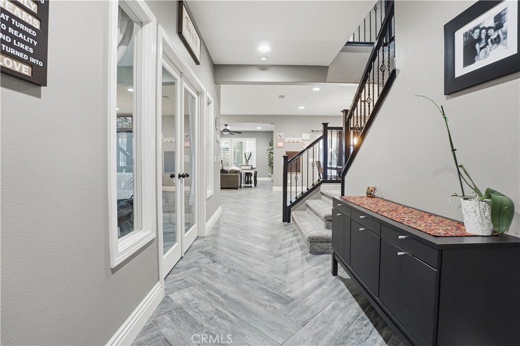 25654 Red Hawk Road Corona, CA 92883 - Photo 3 of 75 a view of entryway and hall with wooden floor