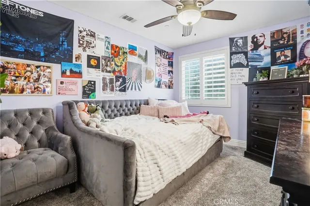 a view of a swimming pool with a table and chairs