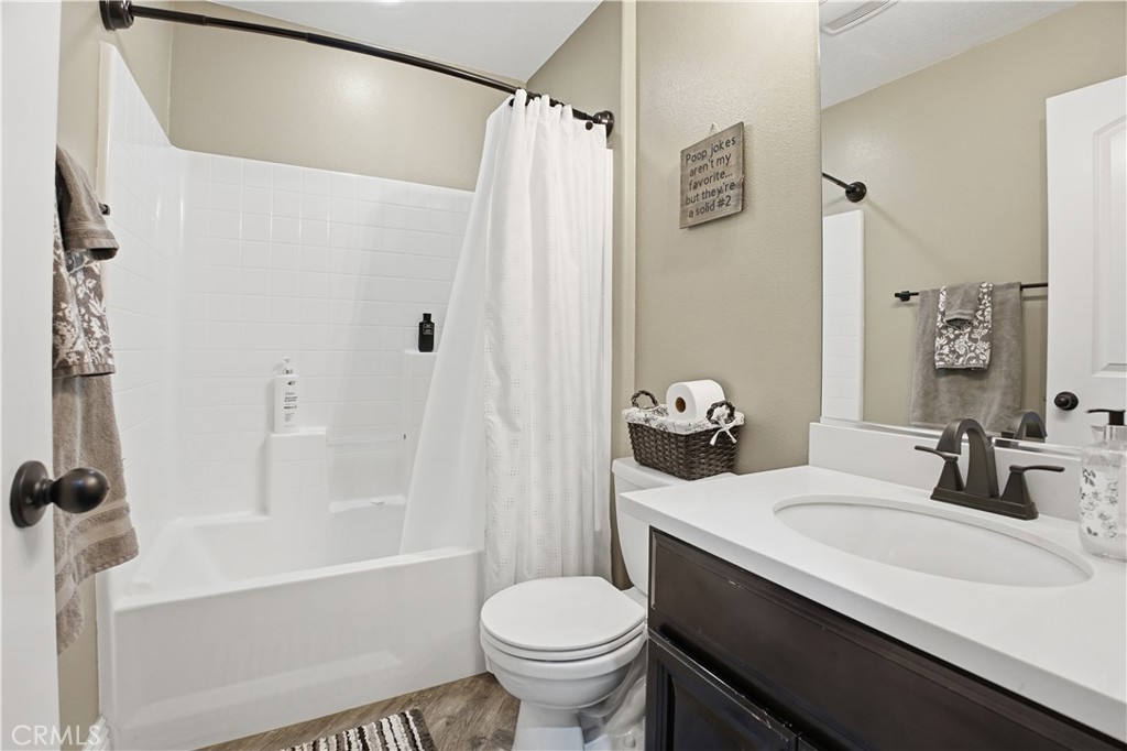 25654 Red Hawk Road Corona, CA 92883 - Photo 38 of 75 a bathroom with a sink toilet tub and shower